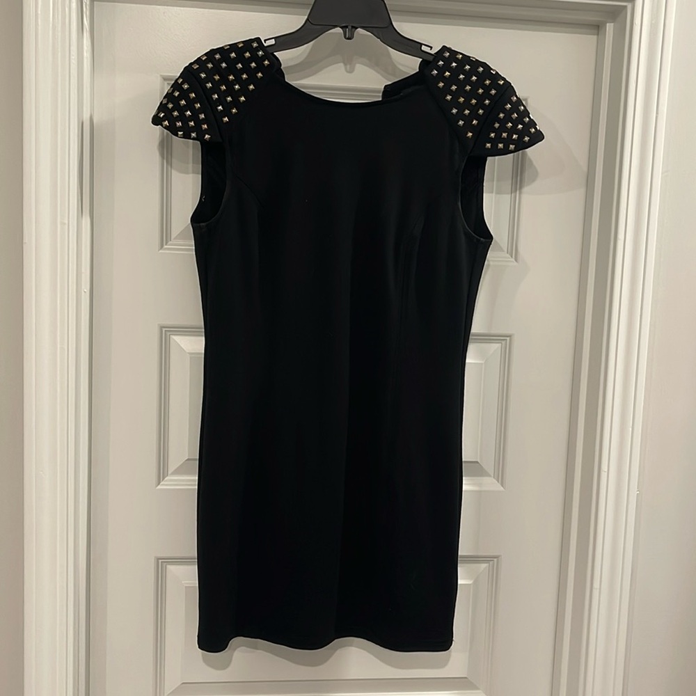 black dress with stud detail and zipper back